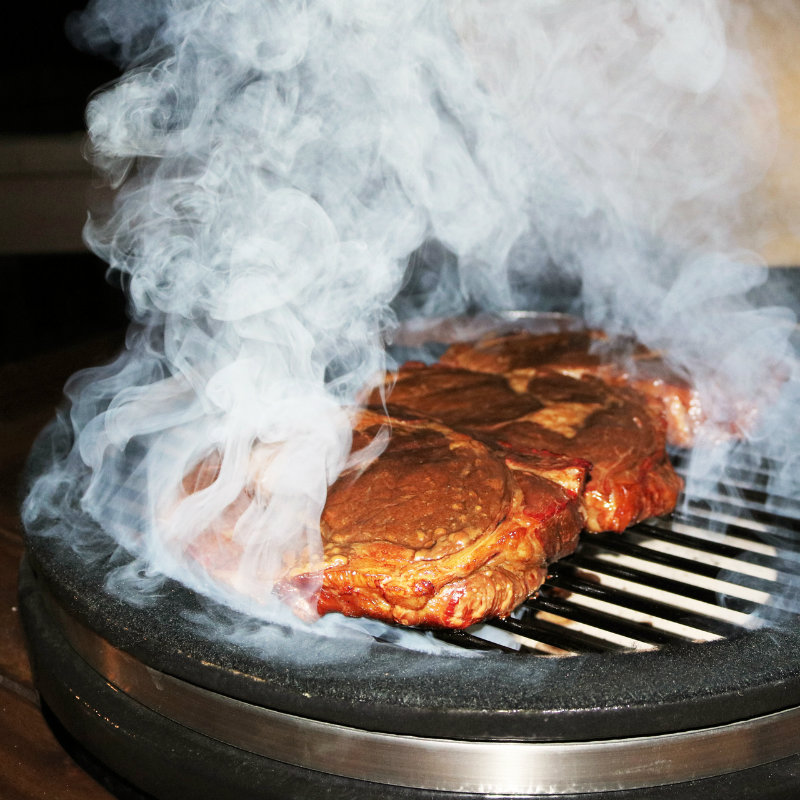 Steaks are perfect done on a Duluth Forge Kamado Grill
