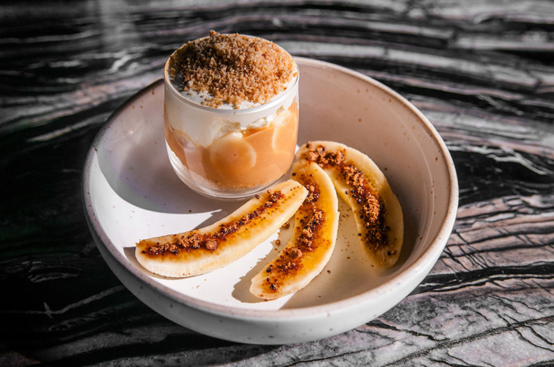 Kentucky bourbon banana pudding with caramel and cookie crumbles